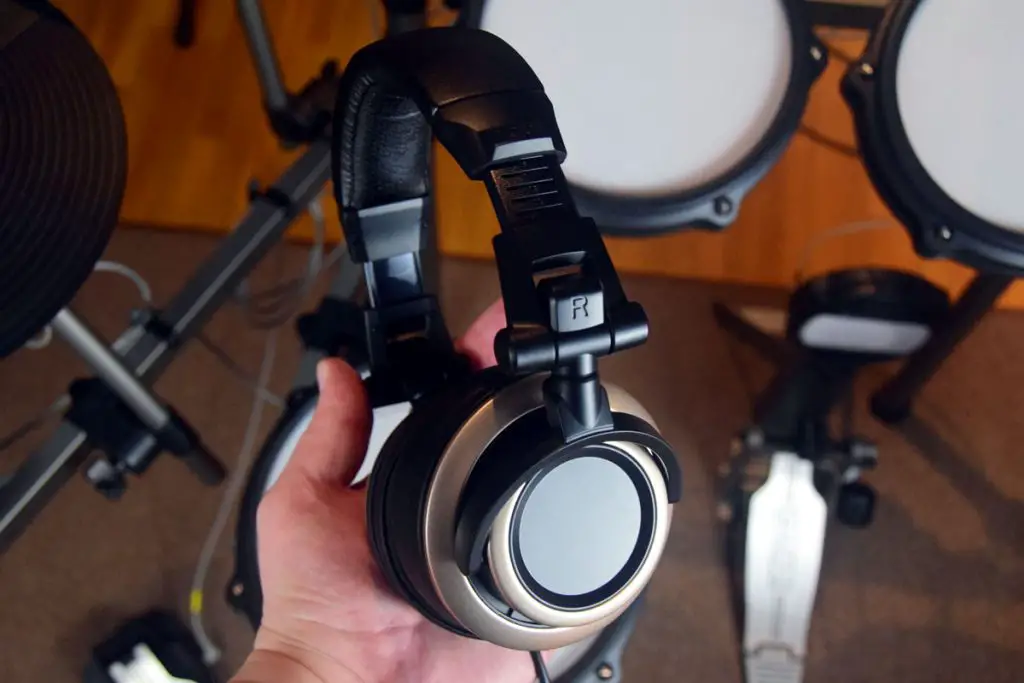 Status CB-1 Headphones In Hand