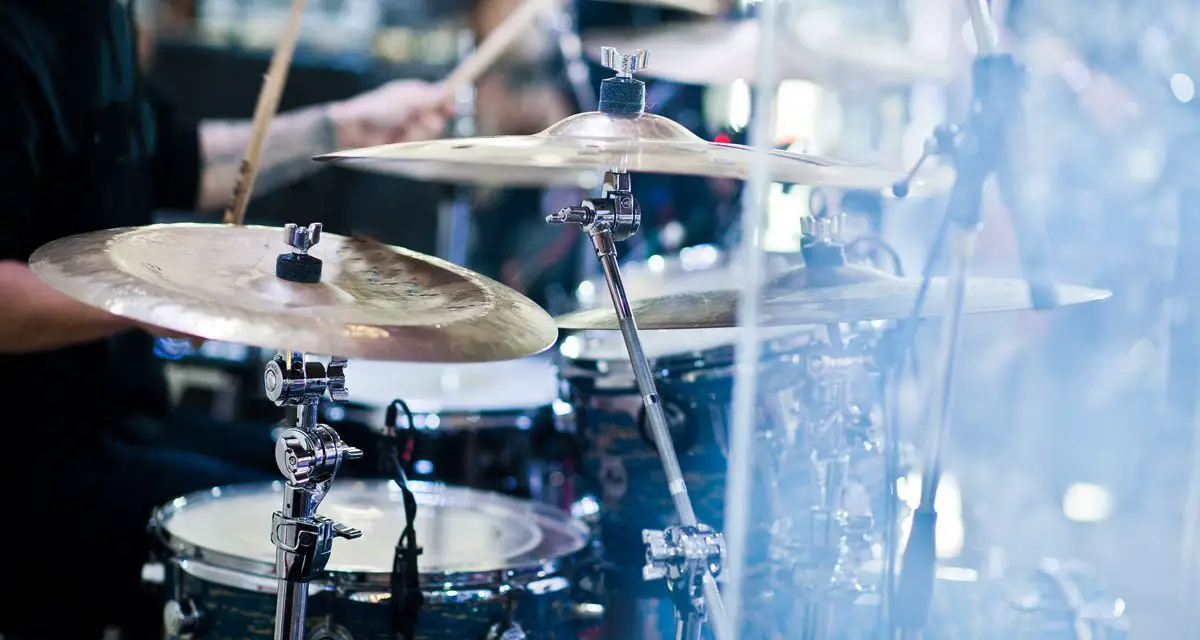 Why Do Some Drummers Sit Behind Plastic?